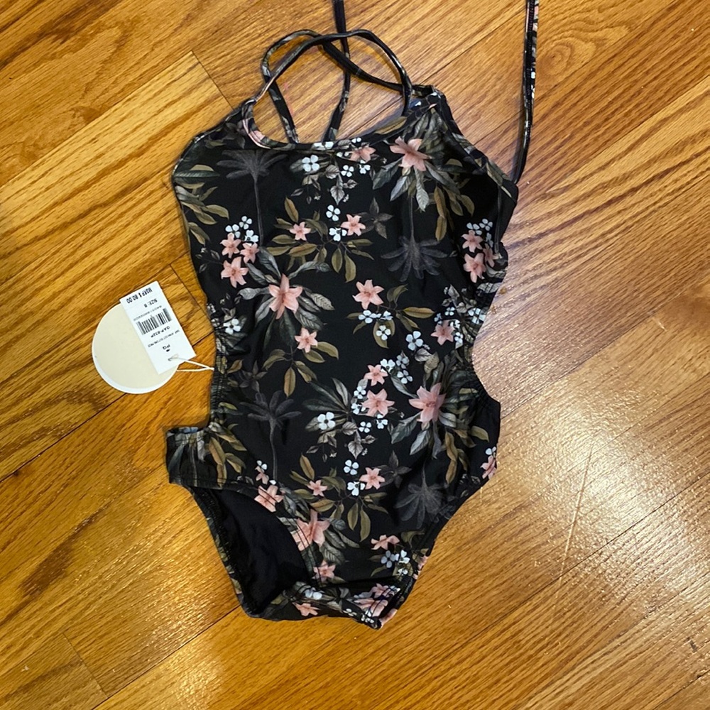 Pilyq one piece with cut outs